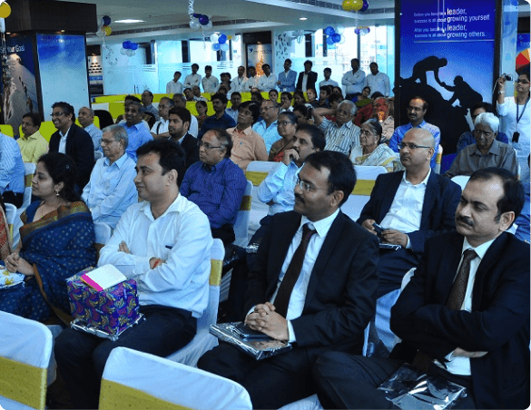 Audience delegates and guests in conference hall